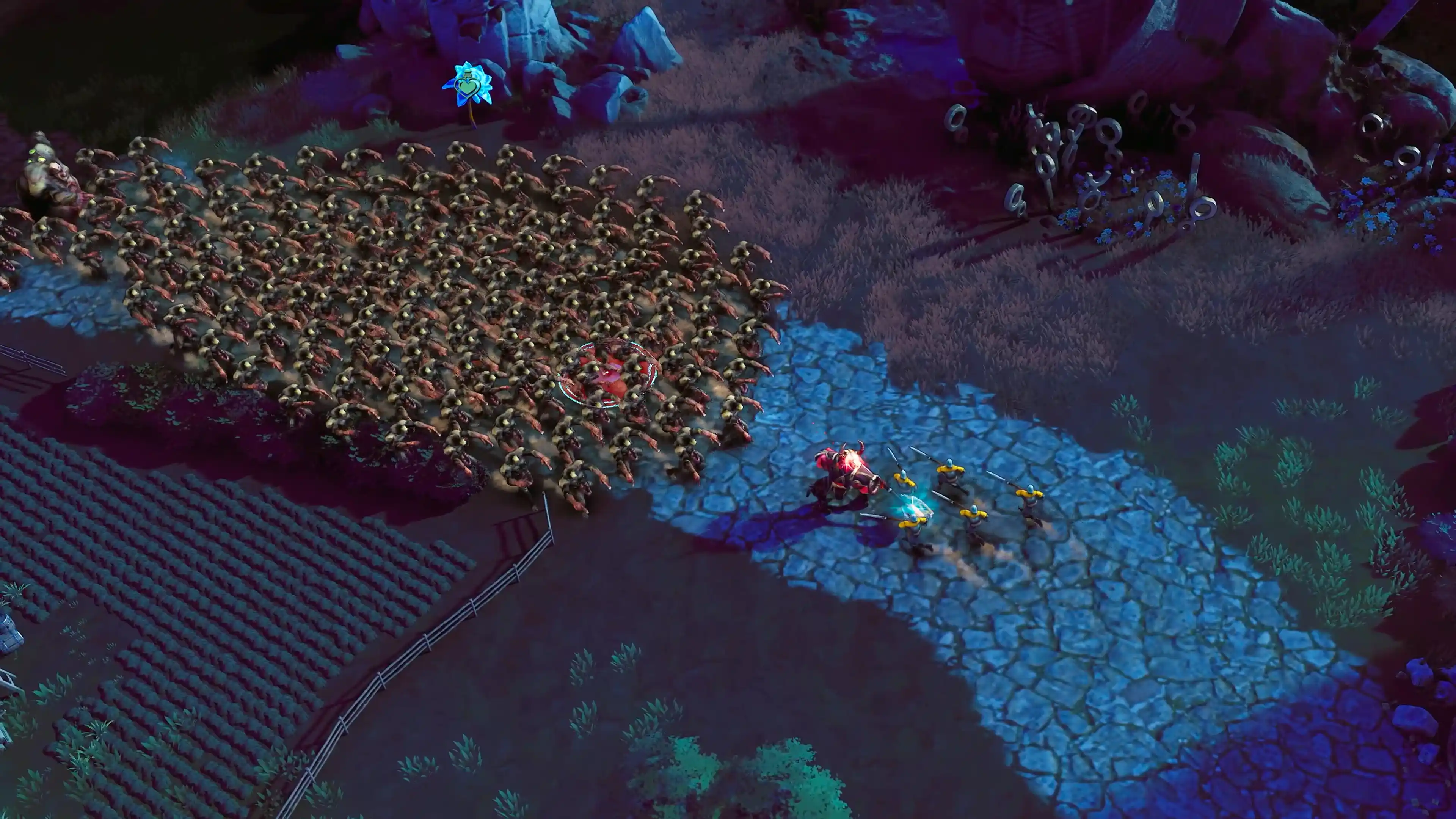 Eversiege night battle with a hero army facing a massive horde of enemy creatures.